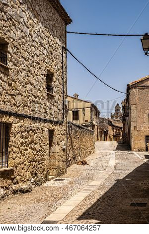 Medieval Village With Stone Houses, Cobblestone Streets, Old Doors And Windows, Arches And Walls. Ma