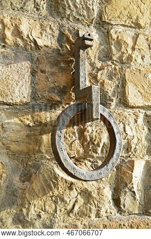 Metal Decorative Detail On The Facade Of A House On Golden Alley #2 In Florence, Italy