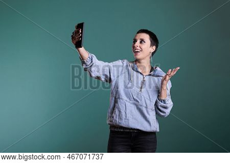 Cheerful Caucasian Female Smiling While Talking With Remote Friend During Online Videocall Meeting O