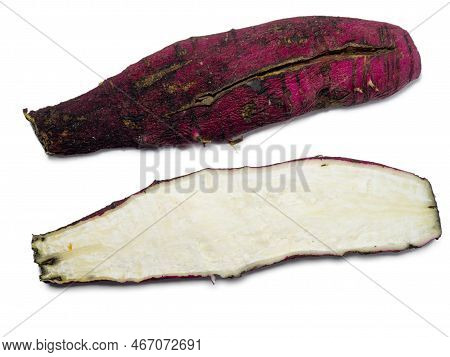 A Long Ugly Radish Cut In Half. Radish Variety. Red Root Crop Cracked. Wrinkled Root. Salad Ingredie