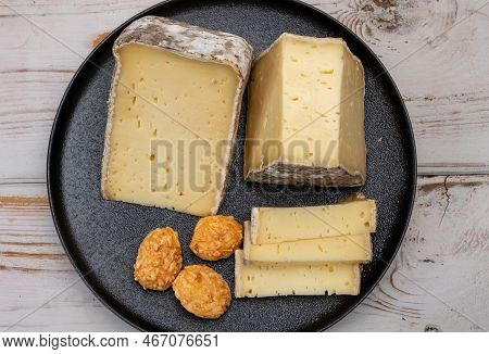 Pieces Of Cheese Tomme De Montagne Or Tomme De Savoie Made From Cow Milk In French Alps