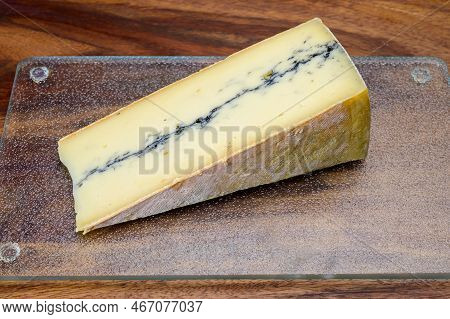French Semi-soft Cow Milk Cheese Morbier From Franche-comte Region With Thin Black Layer And Strong