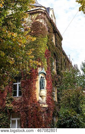 Autumn View Of A House At Joseph Square Located In Maxvorstadt, Munich, Bavaria, Germany.