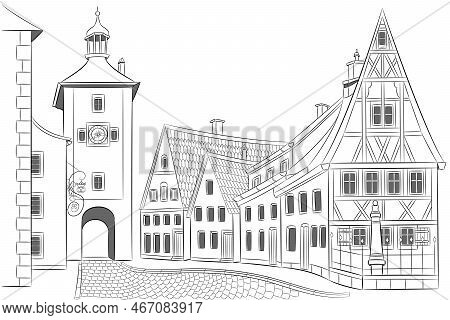 Old Medieval Street With Houses And A Tower In Rothenburg Ob Der Tauber.