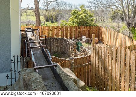 Elim, South Africa - Sep 21, 2022: The Water Furrow, Feeding The Water Wheel At The Mill In Elim, In