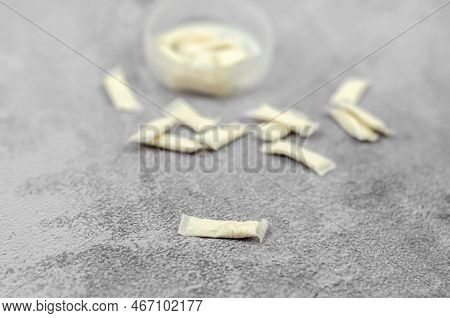 Swedish Snus In Nicotine Sachets, Selective Focus. Open Box With Snus On Concrete Background