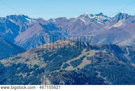 Snow Covered Summit Of Lizumer Reckner In The Background With The Ridge Of Penken In The Front. Beau