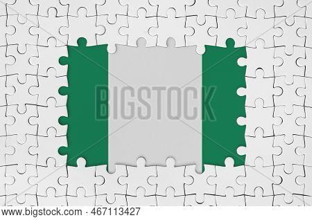 Nigeria Flag In Frame Of White Puzzle Pieces With Missing Central Parts