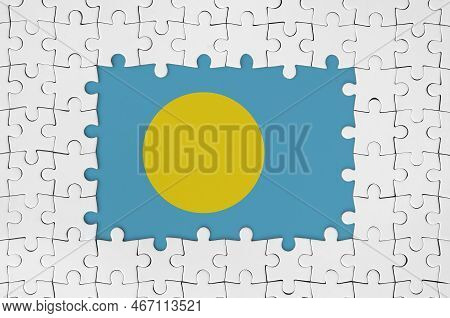 Palau Flag In Frame Of White Puzzle Pieces With Missing Central Parts