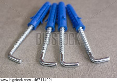 Dowel Hook Universal. Conical Two-material Inserts And Split-ribbed Wall Plugs. Duo Power Fasteners 