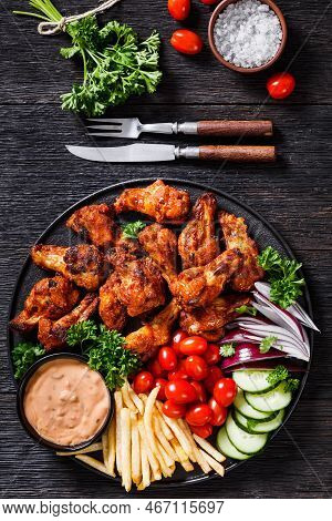 Spicy Roast Chicken Wings With French Fries, Tomatoes, Cucumber, Red Onion And Thousand Islands Dip 