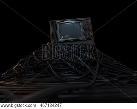 A Vintage 80's Television Perched On A Jumbled Pile Of Black Cables On A Dark Omnious Background - 3