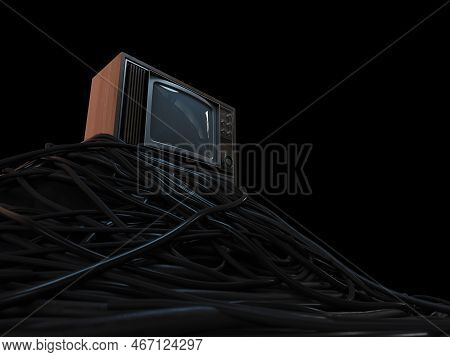 A Vintage 80's Television Perched On A Jumbled Pile Of Black Cables On A Dark Omnious Background - 3
