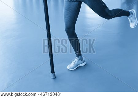 Young Fit Woman Doing Exercise With Bodybar In Gym