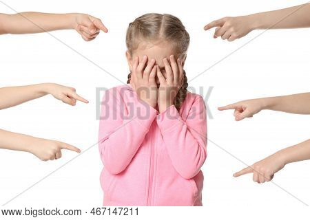 Kids Pointing At Upset Girl On White Background. Children's Bullying