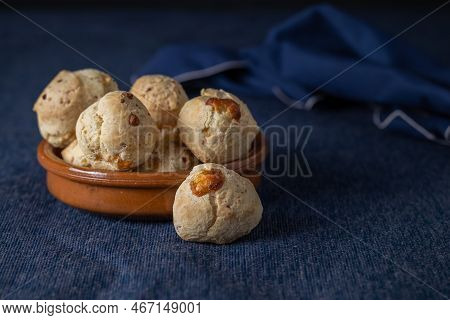 Chipa, Typical Paraguayan Cheese Bread On Blue Tablecloth With Copy Space.
