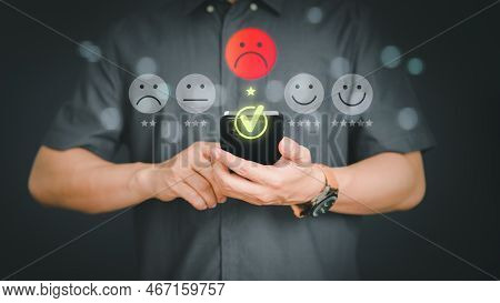 Unhappy Man Customer With Sad Emotion Face On A Mobile Phone. Bad Review And Service Dislike Poor Qu