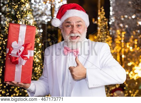 Christmas Party. Senior Man With Beard. Christmas Gift. Happy Santa Claus. Joyful Present Well Remem