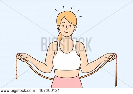 Smiling Young Woman In Sportswear With Measuring Tape Check Measure Waist. Happy Toned Female Take C