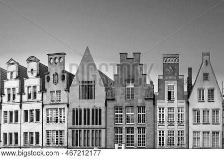 Muenster, Germany - April 29, 2022: Scenic View To Facade Of Old Historic Houses In Panoramic View A