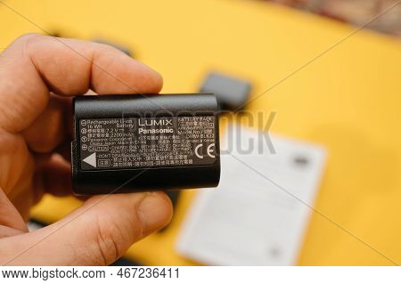 Paris, France - Nov 20, 2022: Male Hand Holding Lumix Dmw-blk22 Rechargable Li-ion Battery For Panas