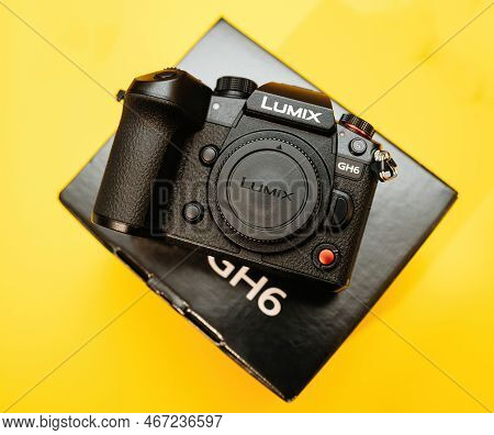 Paris, France - Nov 20, 2022: Unboxed On Yellow Background New Panasonic Lumix Dmc-gh6 Micro Four Th