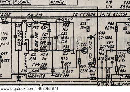 Old Radio Circuit Printed On Vintage Paper Electricity Diagram As Background For Education, Electric