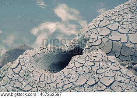 Texture Of A Cracked Swamp That Has Dried Up Near The Water
