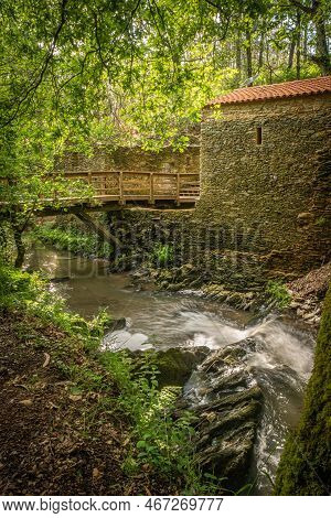 Surrounding Landscape Of The Estanislau Fountain Park And The Lourido River That Divides The Parishe