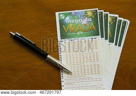 Minas Gerais, Brazil - December 16, 2022: Mega Da Virada Caixa Lottery Tickets