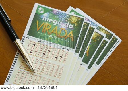 Minas Gerais, Brazil - December 16, 2022: Mega Da Virada Caixa Lottery Tickets