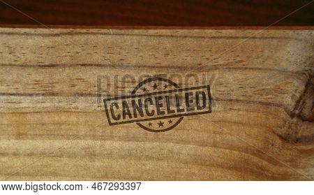 Cancelled Stamp Printed On Wooden Box. Cancellation And Work Annulment Concept.