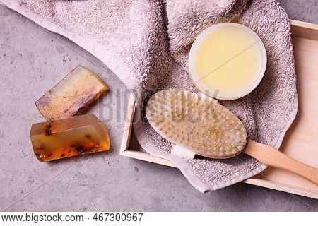 Cosmetic Set For Dry Massage And Towel On Gray Background. Drybrushing.