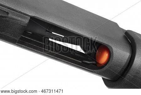 Black Shotgun That Is Out Of Shotshells Isolated On A White Background