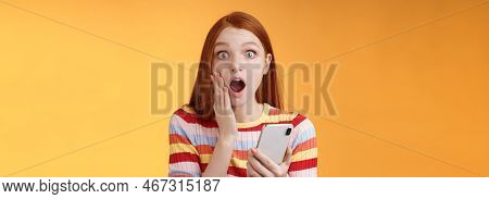 Concerned Shocked Emotive Redhead Girl Find Out Stunning News Look Camera Drop Jaw Gasping Impressed