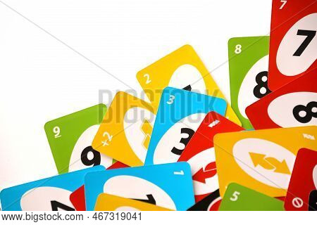 Ternopil, Ukraine - May 15, 2022: Many Colorful Uno Game Cards On White Background Close Up. Uno Is 