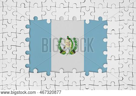 Guatemala Flag In Frame Of White Puzzle Pieces With Missing Central Parts