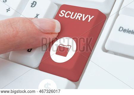 Hand Writing Sign Scurvy. Word Written On Disease Caused By A Lack Of Vitamin C Vile Person