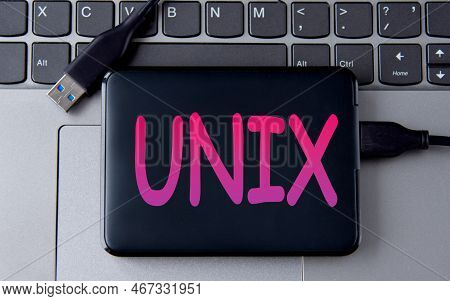 Unix {uniplexed Information Computing System) - Acronum On An External Drive In Gray Letters On The 