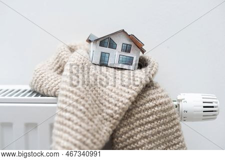Cold In The House In Winter Concept. Weak Heating Efficiency Of A Residential Building Idea. Made Wi