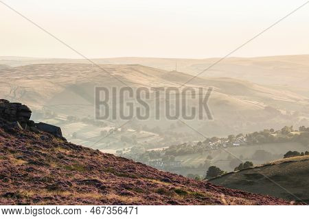 Beautiful Late Summer Landscape Image Looking Through Heather Into Countryside Beyond Using Selectiv