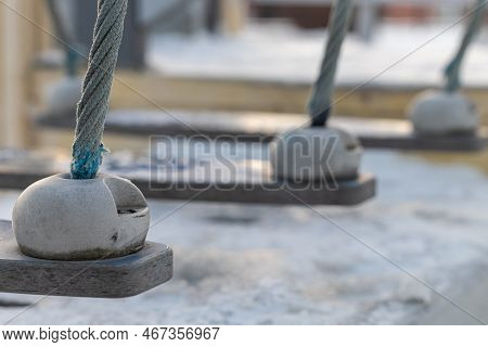 Fixing A Rope Ladder On A Sports Ground. Rope Bridge Attachment. Suspension Bridge