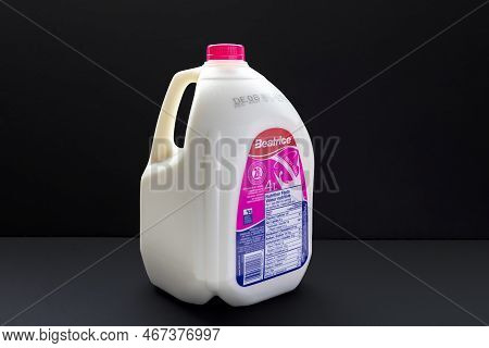 Calgary, Alberta, Canada. Dec 12, 2022. A Beatrice Milk Jug 2% 4l On A Black Background