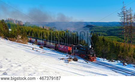 Steam Train During Winter In The Snow In The Harz Germany Brocken Bahn