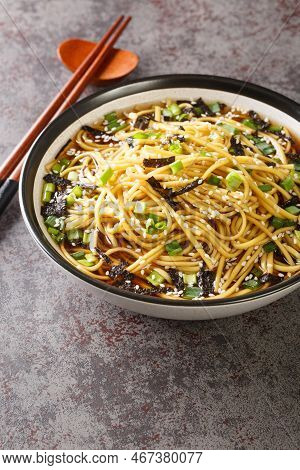 Memil Guksu Is A Traditional South Korean Soba Noodle Soup With Green Onions And Seaweed Closeup In 