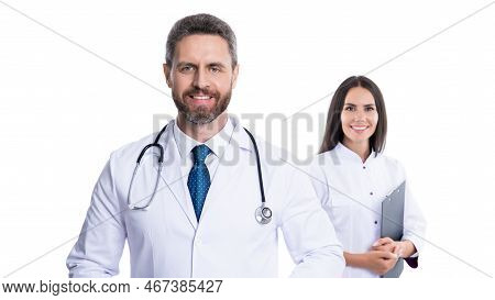 Selective Focus Of Doctor And Nurse Wear White Coat. Nurse And Doctor With Laptop And Anamnesis