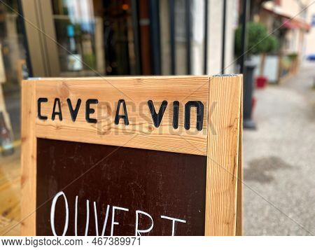 Menthon Saint Bernard, France - September 10 2021 : A Wooden Sign On The Street Indicates A Wine Tas