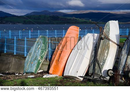 Old Fishing Boats Standing In A Row In Greenock