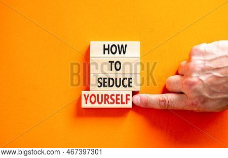 How To Seduce Yourself Symbol. Concept Word How To Seduce Yourself On Wooden Blocks. Businessman Han