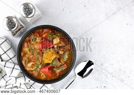 Khashlama - Meat Stew Of Beef Or Lamb Meat With Vegetables And On A Gray Background. Armenian And Ge